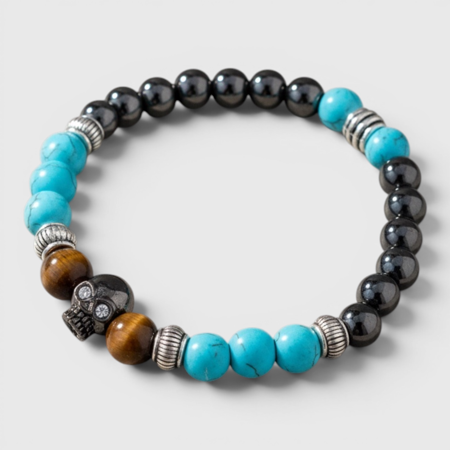 Pulsera de piedras energéticas con calavera central