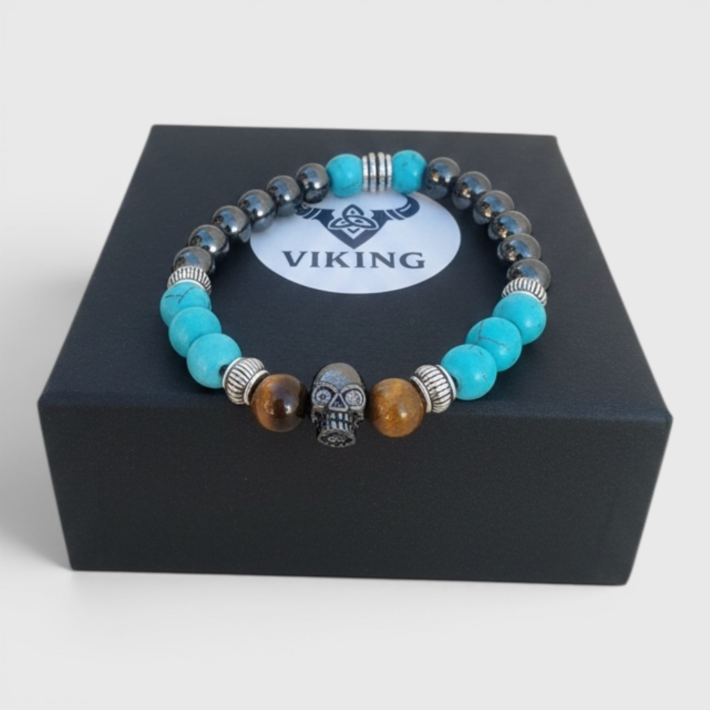 Pulsera de piedras energéticas con calavera central