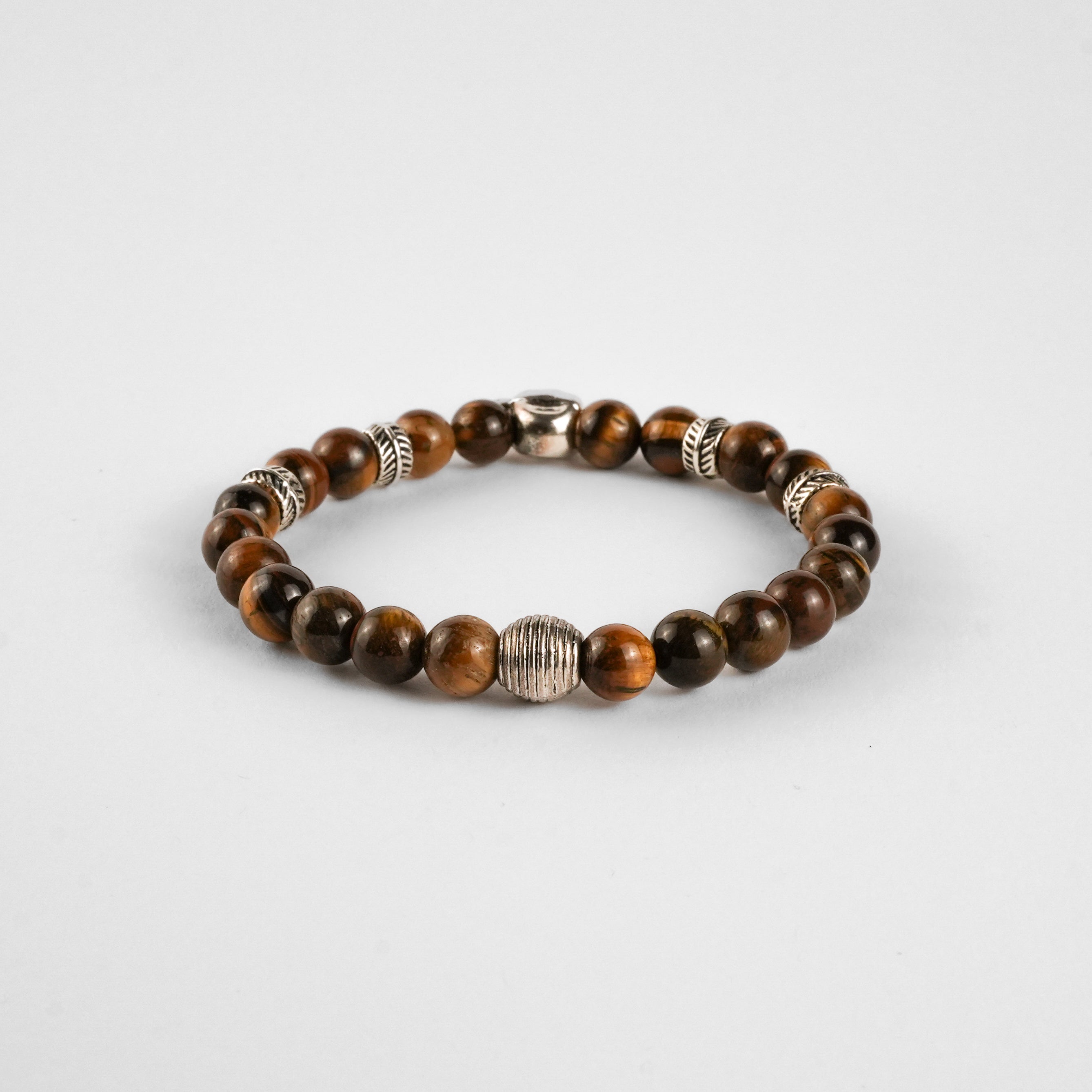 Pulsera de Ojo de Tigre con Calavera — Energía, Protección y Estilo Rebelde