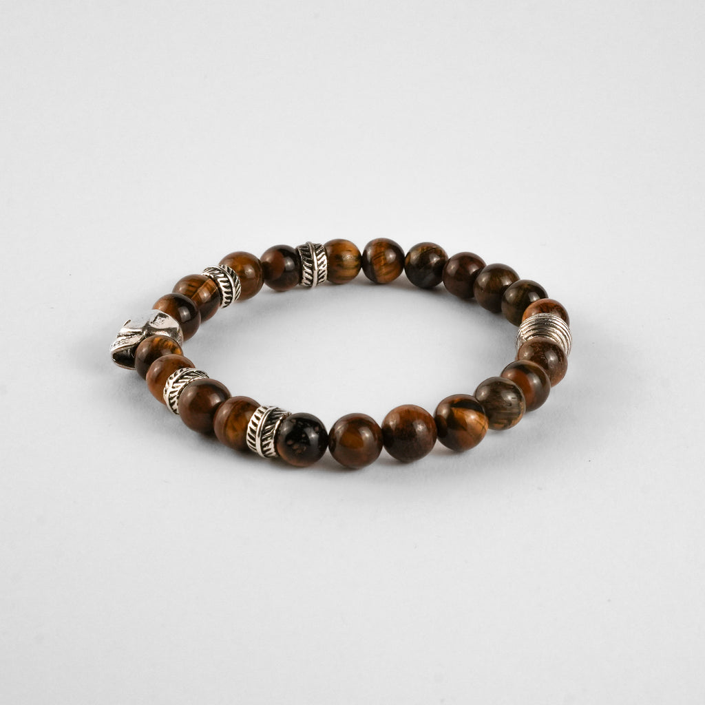 Pulsera de Ojo de Tigre con Calavera — Energía, Protección y Estilo Rebelde