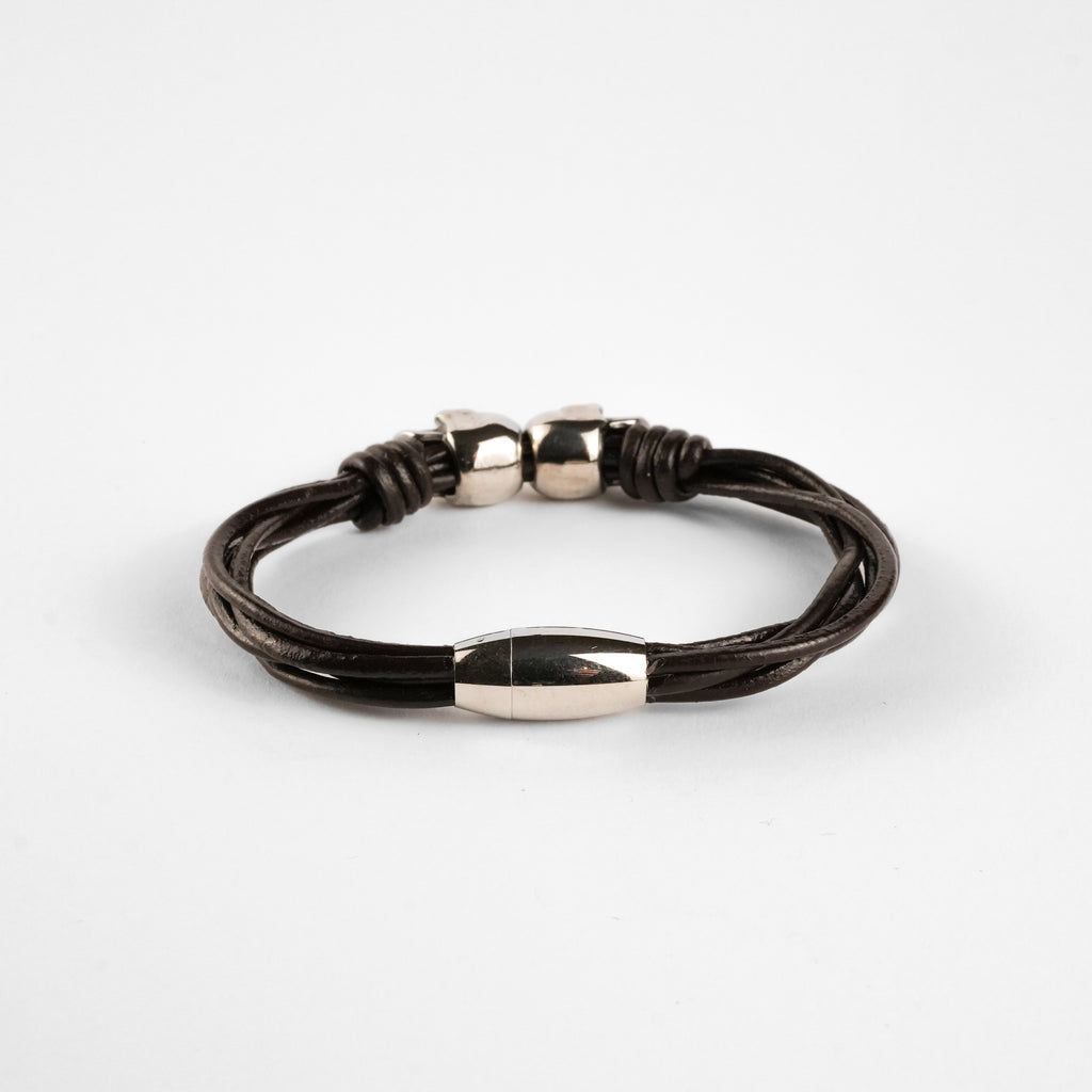 Pulsera Urbana de Cuero Trenzado y Acero Inoxidable con Calaveras