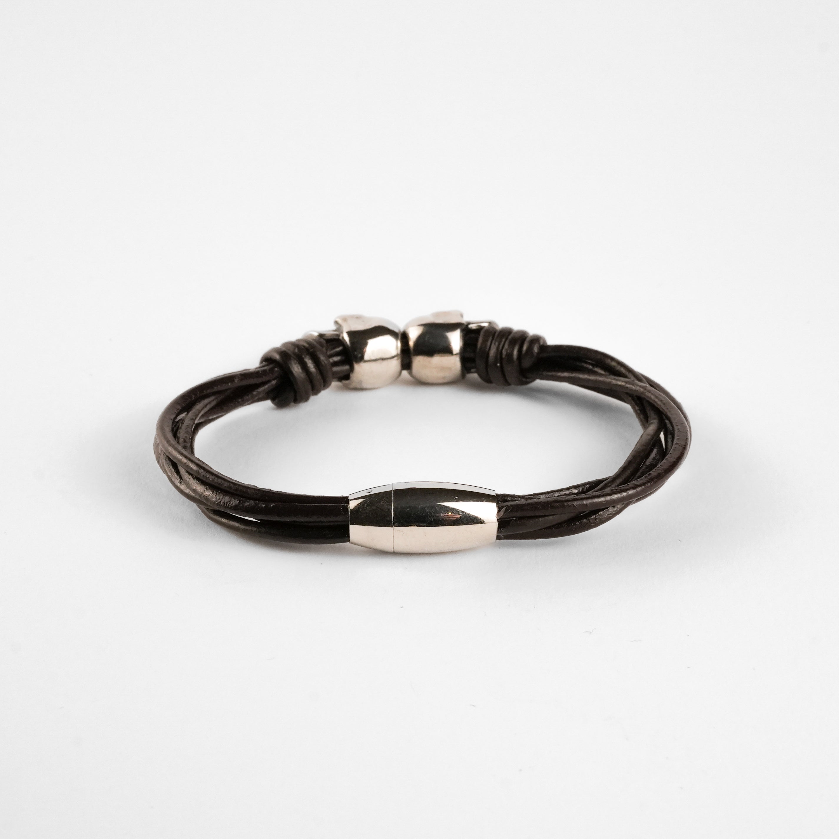 Pulsera Urbana de Cuero Trenzado y Acero Inoxidable con Calaveras