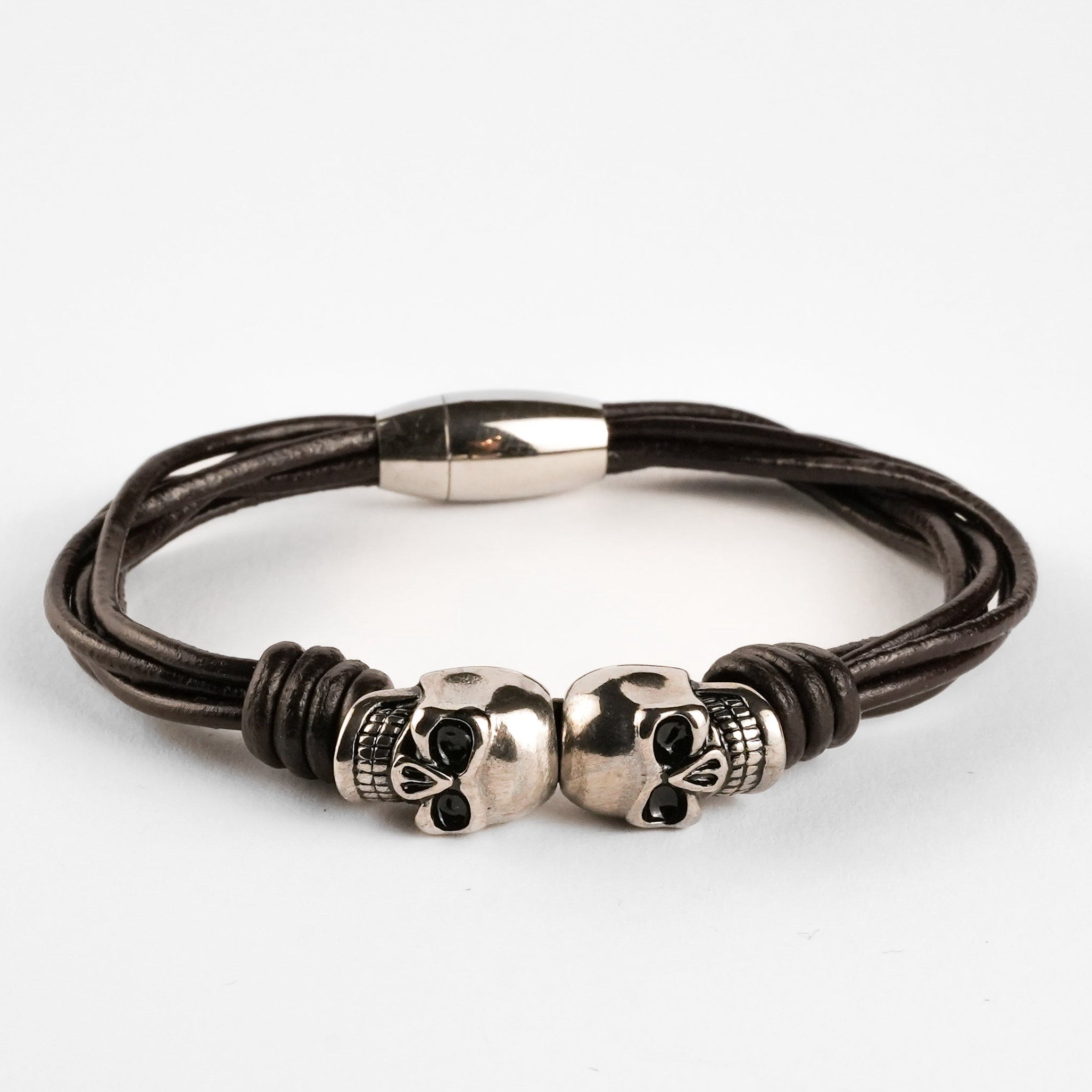 Pulsera Urbana de Cuero Trenzado y Acero Inoxidable con Calaveras